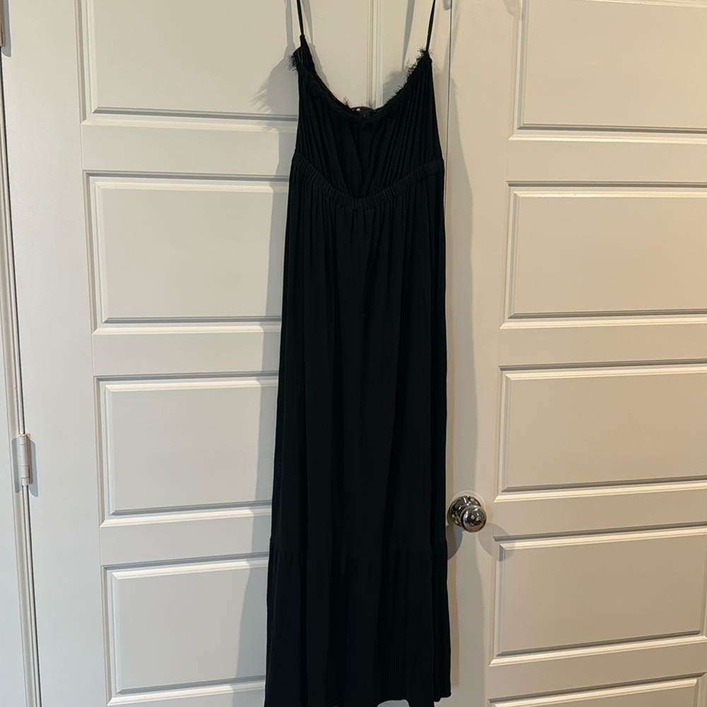 Black strapless maxi dress.